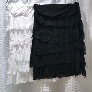 Black and white ruffled silk skirts